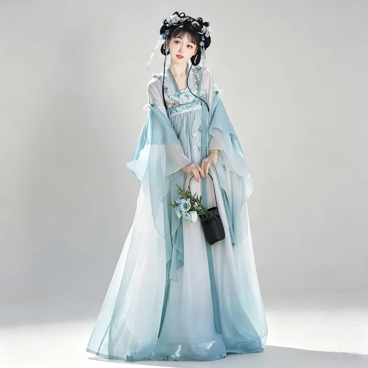 Aqua blue and white gradient Tang-style Hanfu with an embroidered Qixiong skirt