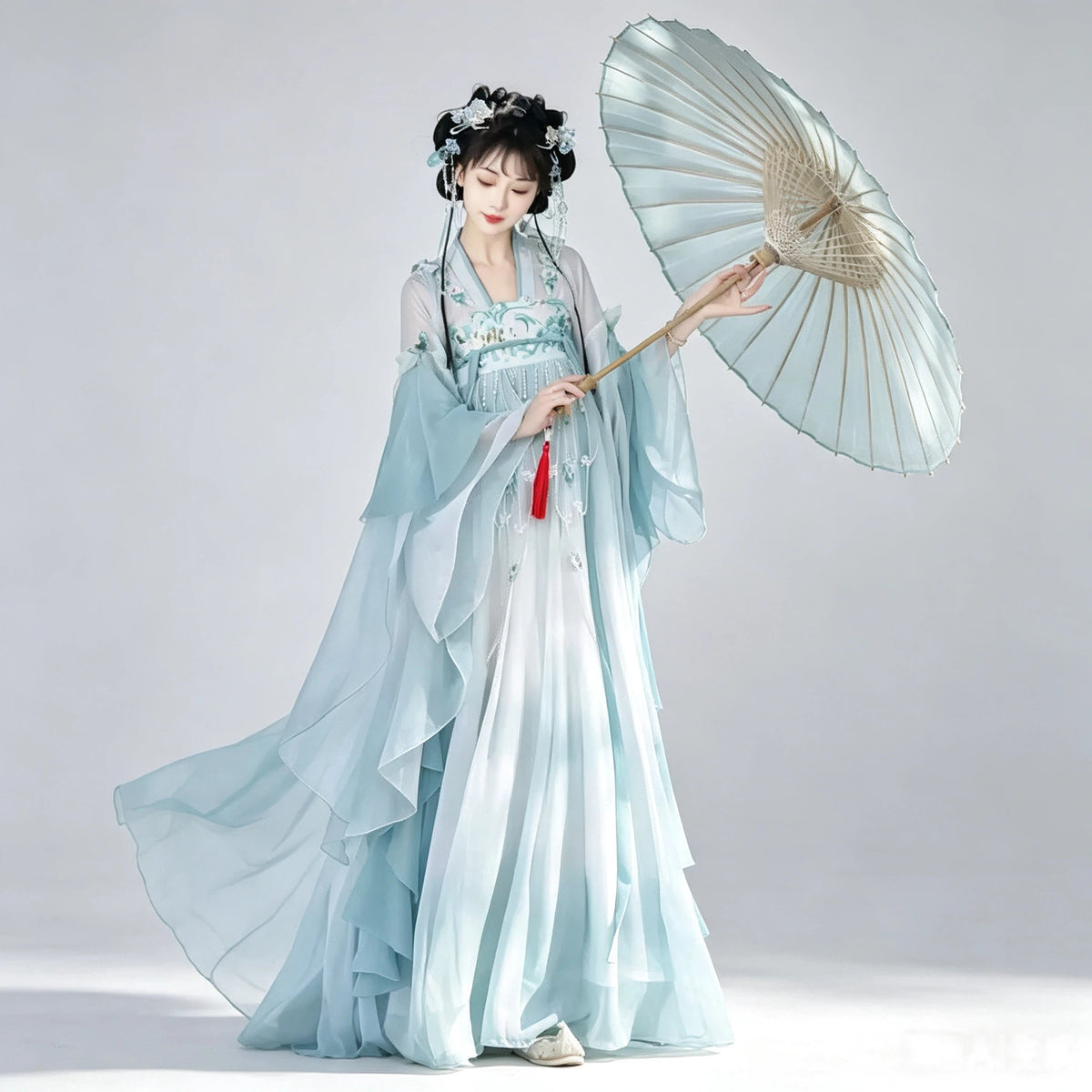 Women's blue ombre Qixiong Ruqun outfit with a sheer shawl