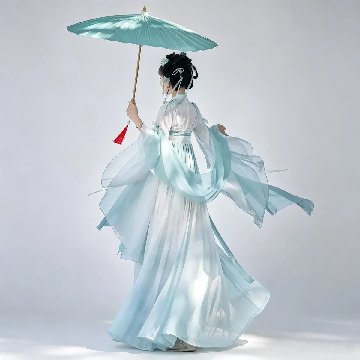 Gradient aqua Hanfu with a matching draped shawl