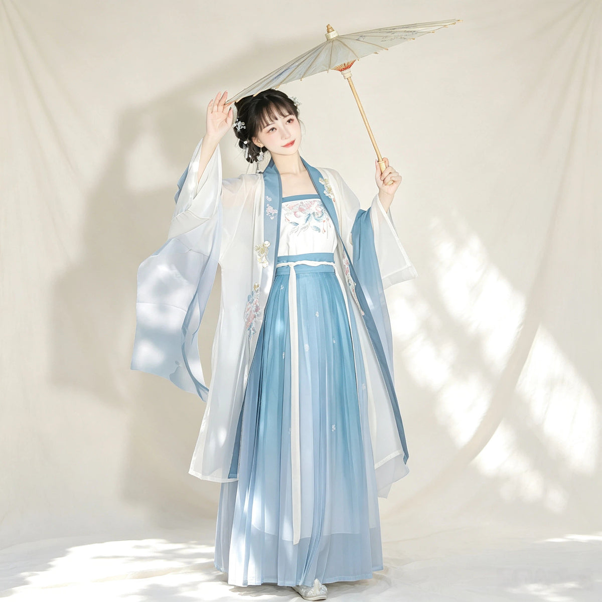 Blue ombre Song-style Hanfu with a sheer robe and pleated skirt