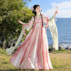 Pink and sage green Hanfu with butterfly motifs