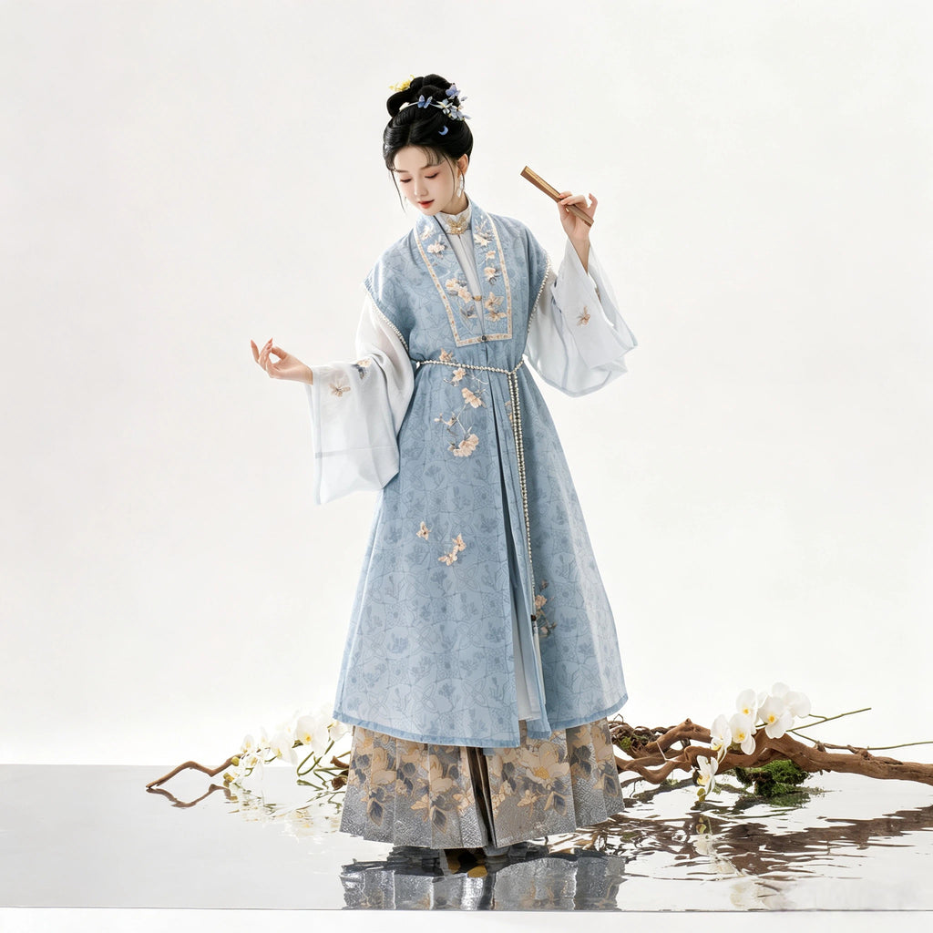 Blue Ming-style Hanfu with a camellia embroidered Bijia vest and horse-face skirt
