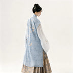 Ming-inspired blue Bijia vest featuring camellia floral embroidery