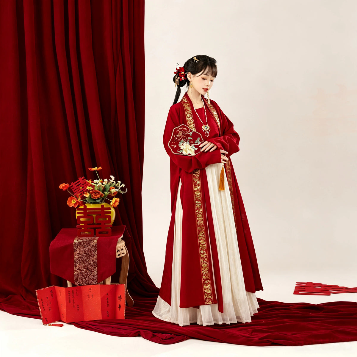 Red and cream bridal Hanfu set with a long cardigan and pleated skirt