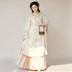 Ming-inspired cream Hanfu robe with a peach Yunjian cloud collar