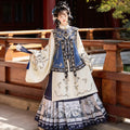 Ming-style Hanfu set with a yellow robe, navy vest and horse-face skirt