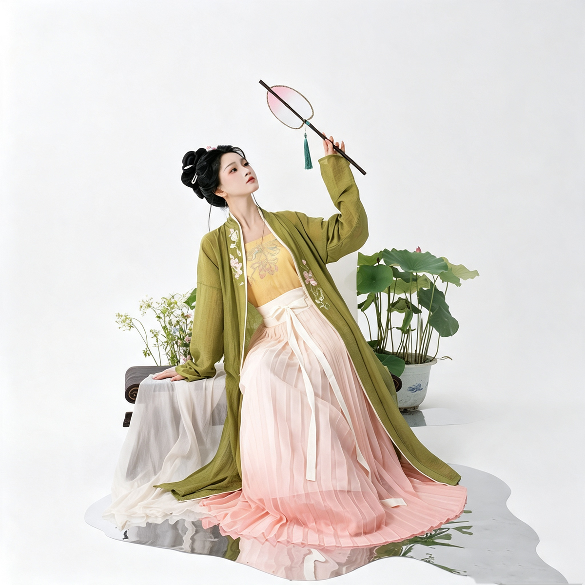 Women's pink and green pleated Hanfu gown with floral embroidery