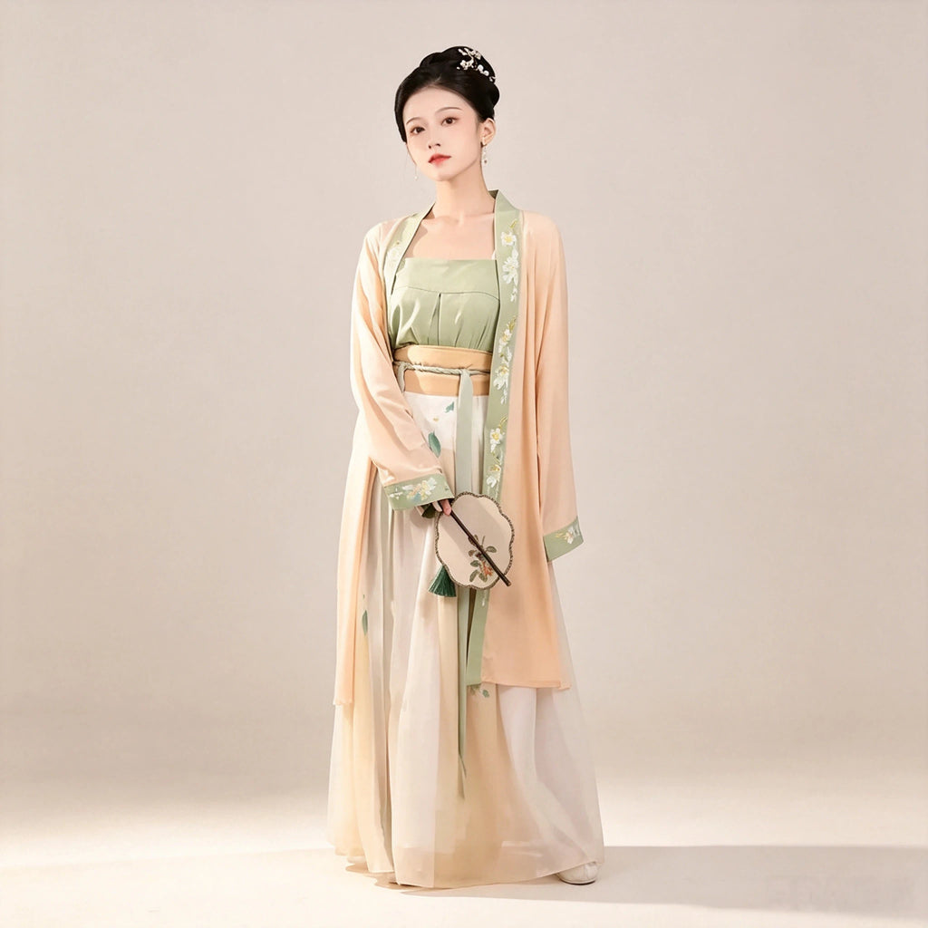 Pale orange Moxiong top paired with a sage green Hanfu outfit