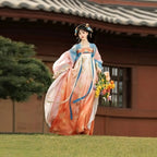 Tang-inspired orange and blue Hanfu outfit with a high-waisted skirt