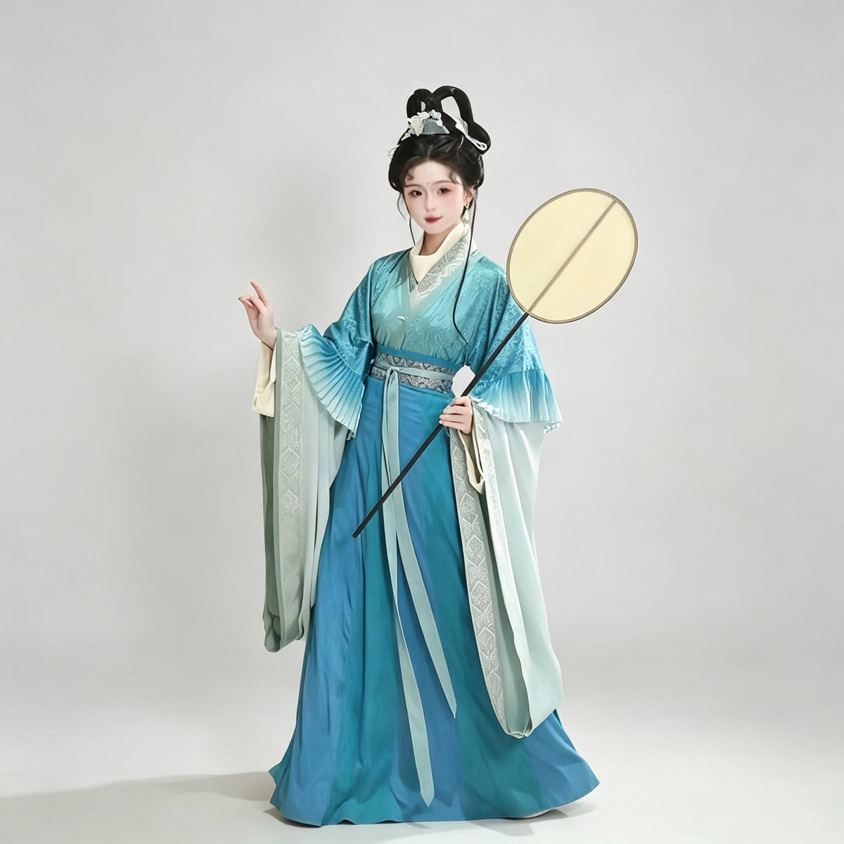 Teal blue ombre Wei-Jin style Hanfu with wide sleeves and jacquard fabric