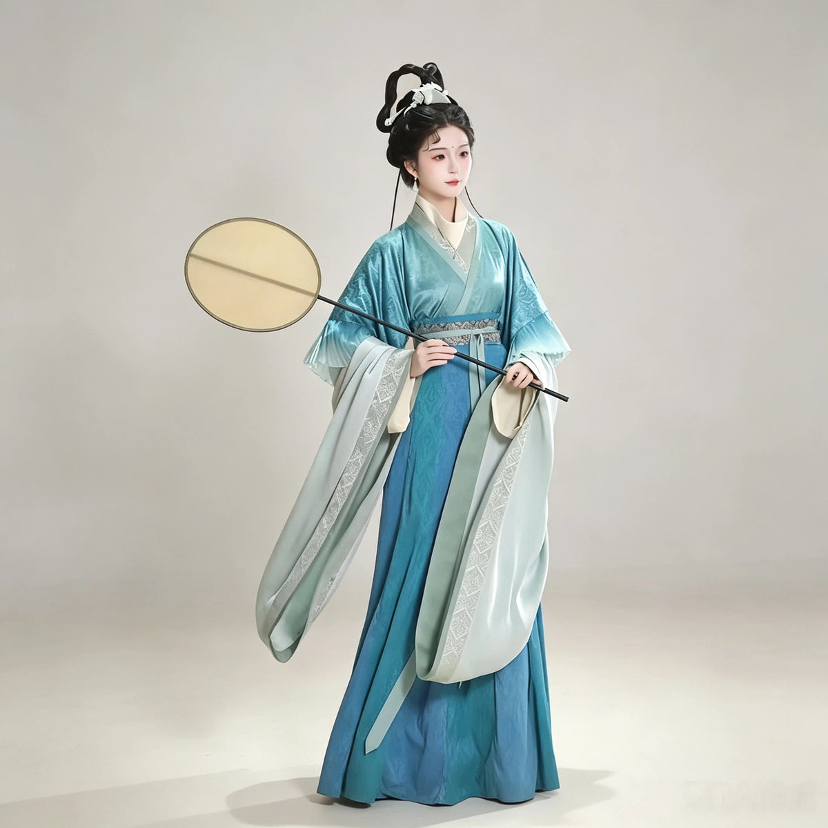 Jacquard teal Hanfu with a crossover collar and layered skirt