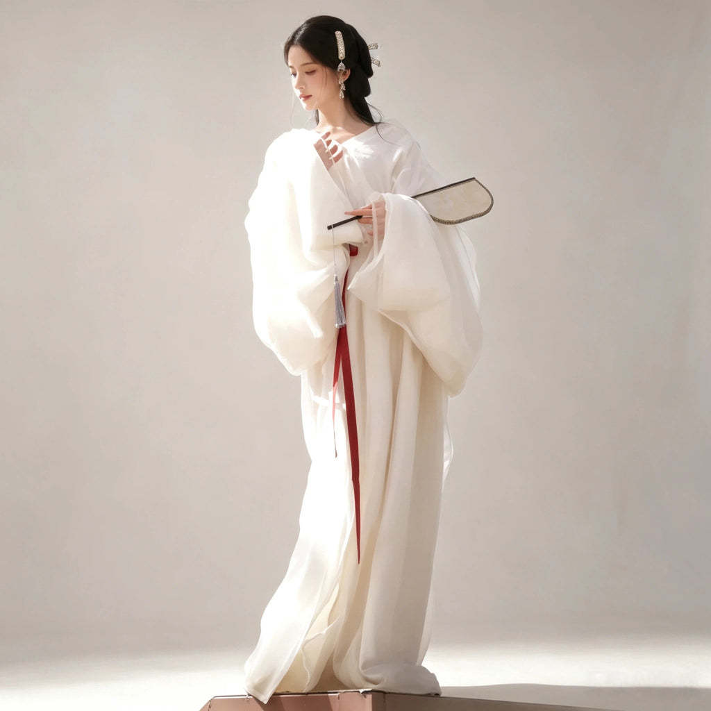 White Wei-Jin style Hanfu with sheer wide sleeves and red sash