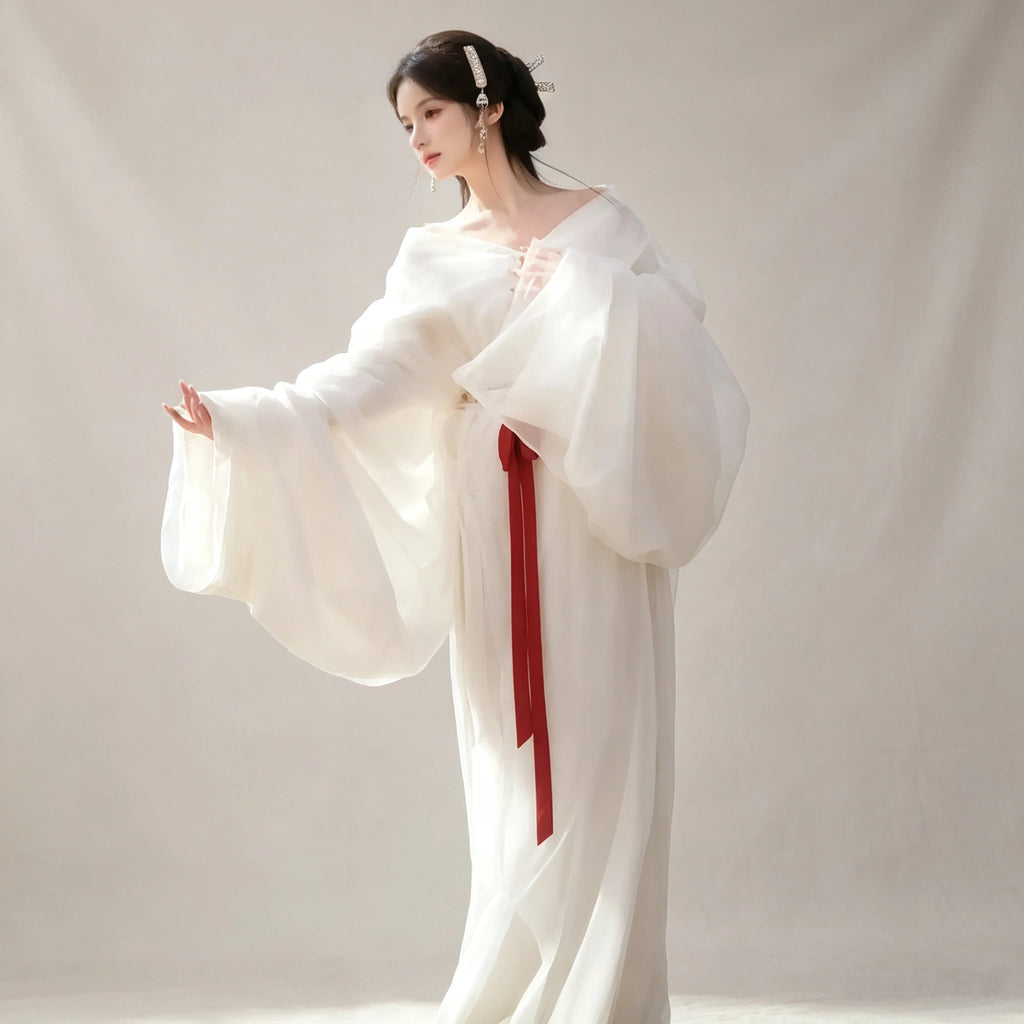White crossover-style Ruqun with a long flowing skirt
