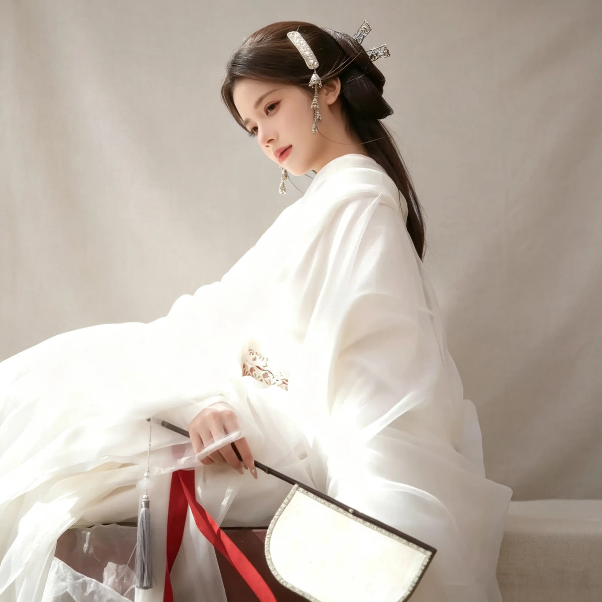 Sheer white wide-sleeve Hanfu set with red sash accent